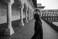 Black and white image of an Indian woman at the Agra Fort. Agra, Uttar Pradesh, India, Asia. Royalty Free Stock Photo