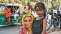 Agra, India - December 12, 2018: Portrait Indian mother and daughter on the streets of the city.