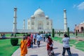 Local Indian People visiting the Taj Mahal in the Sunny Day