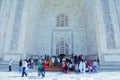 Local Indian People visiting the Taj Mahal in the Sunny Day