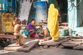 Agra/india-15.04.2019:Mother washing her kids on the indian street Royalty Free Stock Photo