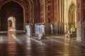 people visit Taj Mahal in India and pray in the mosque