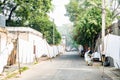 AGRA, INDIA - NOVEMBER 8, 2017: White sheets hang on ropes in Indian street Royalty Free Stock Photo