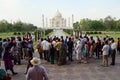 Crowd of people trying taking photo of The Taj Mahal