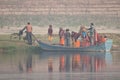 Indian families crossing the Yamuna River in Agra.