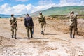 Agri, Turkey - May 24, 2017. Turkish soldiers walking on muddy road