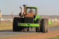 Agrico tractor on a road near Lichtenburg in South Africa