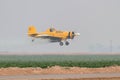 Agricultural aircraft cropdusting a farmers field