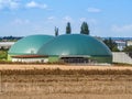 An agricultural biogas plant with fermenter and gas storage tank
