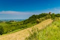 Agricultural cultivated fields and ancient stronghold in Italy Royalty Free Stock Photo