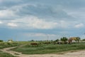 Agricultural equipment on a background of gloomy sky Royalty Free Stock Photo