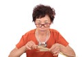 Agricultural experts hold a magnifying glass to view the mature wheat ears sampled Royalty Free Stock Photo