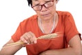 Agricultural experts are looking at the mature wheat ears sampled Royalty Free Stock Photo