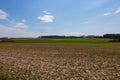 Agricultural fields in the hillside dutch: Heuvelland in the south of the Netherlands with amazing views over the landscape duri Royalty Free Stock Photo