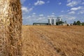 Agricultural Grain Bins in a Farm Field After Harvest Royalty Free Stock Photo