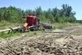 Agricultural irrigation system that distributes water pumped into the river