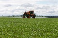 Agricultural irrigation truck tractor spraying pesticides Royalty Free Stock Photo