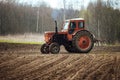 Agricultural land in the fieldagricultural tractor plows the land