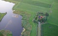 Agricultural landscape of Friesland, one of the northern provinces of the Netherlands - Friesland from above - Local farm with