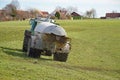 Agricultural machine in the farm watering and fertilizing the land with liquid animal manure