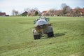 Agricultural machine in the farm watering and fertilizing the land with liquid animal manure