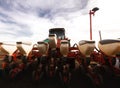 Tractor and seeder for sowing corn