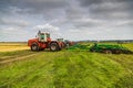 Yekaterinburg, RUSSIA - August 23, 2018: Agricultural machinery in wheat field