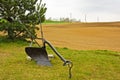 Agricultural manual plow on the grass