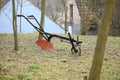 Agricultural old manual plow on grass