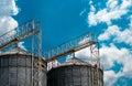 Agricultural silo at feed mill factory. Flat silo for store and drying grain, wheat, corn at farm. Storage of agricultural Royalty Free Stock Photo