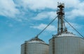 Agricultural silo at feed mill factory. Silo for store and drying grain, wheat, corn at farm. Agricultural manufacturing. Tank for Royalty Free Stock Photo