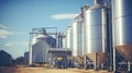 Agricultural silo at feed mill factory. Tank for store grain, corn, soybean in feed manufacturing. Royalty Free Stock Photo