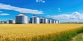 Agricultural Silos - Building Exterior, Storage and drying of grains, wheat, corn, soy, sunflower against the blue sky with rice