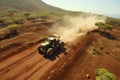 Agricultural tractor driving through scenic village fields, stunning aerial view