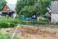 Agricultural utensils in the yard, rural yard landscape