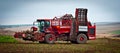 Agricultural vehicle harvesting sugar beet