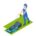 Agricultural work. Woman lawn mower grass cutting farmer harvest in garden . Lawn mover on green grass. Machine for Royalty Free Stock Photo