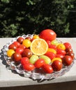 Lemon and cherry tomatoes in different colors