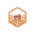 agriculture corn field farm industry vector logo design with tractor in the land inside polygon