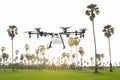 Agriculture drone flying on the green rice field