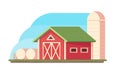 Agriculture. Farm landscape. Red barn, hopper for grain storage and harvest, silo storage and haystack. Royalty Free Stock Photo