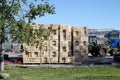 Farm, empty vegetable boxes for packing and tractor