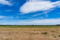 Agriculture landscape with round bales of straw on a field