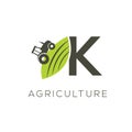 Agriculture logo letter K. Tractor icon. Green food emblem