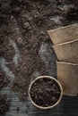 Agriculture peat glasses soil on wooden board