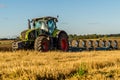 Agriculture plowing tractor on wheat cereal fields