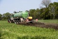 Agriculture, spreading manure. Germany, Europe Royalty Free Stock Photo