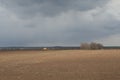 Agriculture.The tractor prepares the field for sowing wheat in Royalty Free Stock Photo