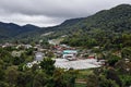 Agricuture village in valley with small green house for agricultual production Royalty Free Stock Photo