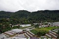 Agricuture village in valley with small green house for agricultual production Royalty Free Stock Photo